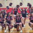 The cheer team performed a routine.