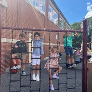 Students play on the Center School Playground that will be closed for the next few weeks for resurfacing construction. 