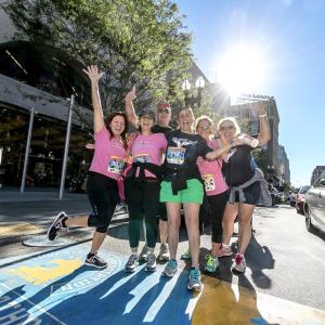 (From left to right) Kara Pernice, Deborah (Pernice) Duffy, Rick Duffy, Donna Tocci, Sue Kindregan and Nora McKenna finish the Jimmy Fund Walk at the marathon finish line in 2016. Source: Donna Tocci