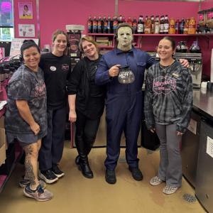 "Michael Myers" with the staff of Mary Lou's Coffee.