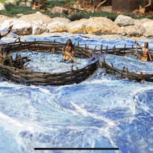 Men working on a fish weir at the mouth of the Mattapoisett River in the Museum's diorama depicting what the Wampanoag village of Mattapoisett may have looked like 2,000-3,000 years ago. Source Phil Mello