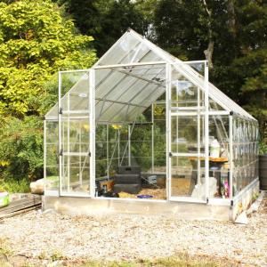 A new greenhouse stands on the property.