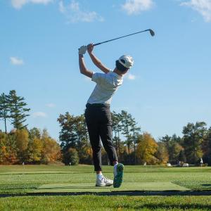 John Bongiorno watches the ball fly.  John Bongiorno watches the ball fly.