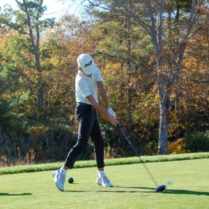 John begins his round.  John begins his round.