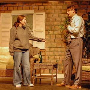 Jade Beauregard (Catherine) and Oliver Asker (Hal) converse on the porch where every scene takes place.