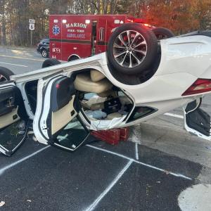 A Toyota Avalon containing a driver and one passenger rolls over due to a collision. Source: Marion Fire/EMS Facebook A Toyota Avalon containing a driver and one passenger rolls over due to a collision. Source: Marion Fire/EMS Facebook