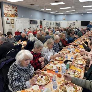 Aging residents attended a free Thanksgiving luncheon put on by Old Colony students. 