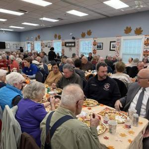 The room was packed with happy attendees.