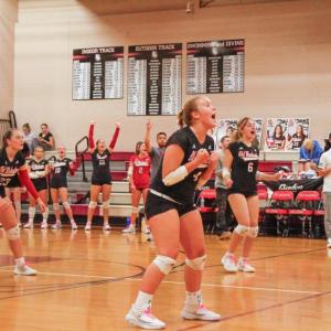 Senior Maya Morrison and her team score a point. Photo by Grace Ann Natanawan. 