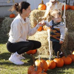 Fairhaven resident Dayme Maloney with her 1-year-old son Bennett Maloney pick out pumpkins. Photos by Grace Ann Natanawan