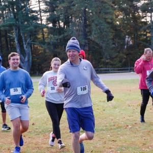 Mark Milhench, Teddy Caroll and Ella Bartholomew, 3 Old Rochester alumni, run in an alumni organized cross country race. Photo by Mari Huglin 
