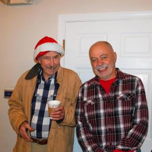 Two friends pose as they share the Christmas spirit.