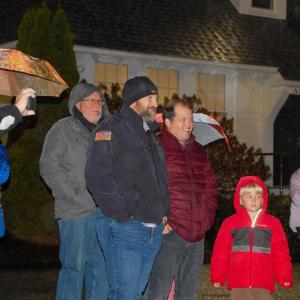 Rochester Police Chief Assad and Pastor Colby Olson watch as the tree is about to be lit.