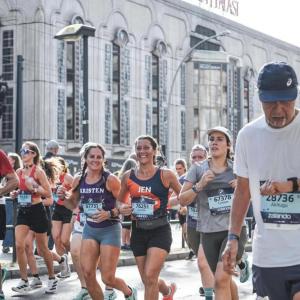 Pease running the Berlin Marathon, September 21, 2025 with her running partner, Kristen Wingate.
