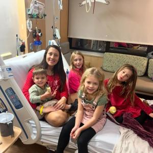 Pease and her 4 children visiting in the hospital, December 5, 2024, the day Pease was diagnosed with MS.