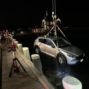 The Marion Fire Department successfully removed the car from the harbor.