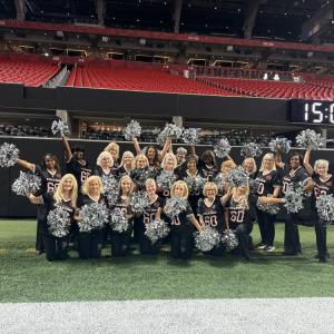 Elaine Botelho with the other cheerleaders from the 1960s and 1970s. Source: Elaine Botelho 