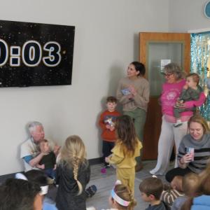 Attendees count down the seconds to noon. 