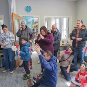 Kids and their caregivers celebrate after the countdown. 