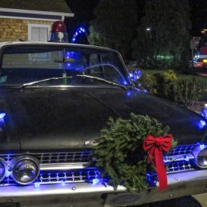 The decorated police cruiser, on loan from Murphy's Towing. 