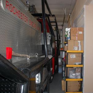 The fire engines are parked inches from the walls. 