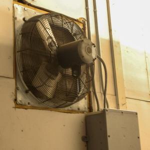 The one small fan that rids toxins and exhaust from inside the fire station.