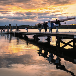 A photograph titled "Morning Practice" shows Tabor Academy rowers setting up for a morning practice. Photos by Tianxu Zhou
