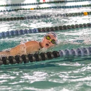 Elizabeth Chubb swims down a lane at the  Gleason Family YMCA during a Friday, Jan. 23 practice. Photos by Bobby Grady