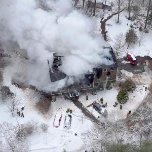 The fire was quick-moving and severely damaged the house. 