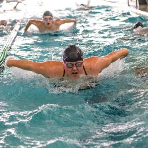 Morgan Conner shares a lane at practice. 