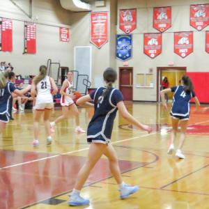 Sadie Hartley-Matteson looks to dribble down the court.  