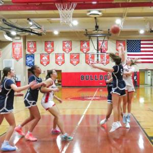Sydney Bosma shoots the ball. 