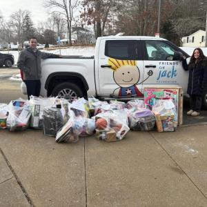 Board member Sam Philbrook, left, and Christina Tetrault, a guidance councilor at Sippican Elementary School, during a toy delivery to the school on Sunday Dec. 18, 2025. 