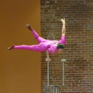 Part of Liu's act is a one-handed handstand. 