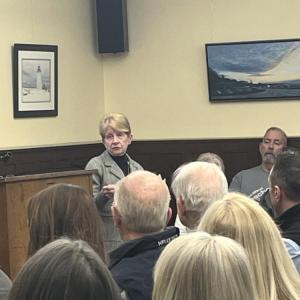 Kathy Eklund, Board of Health candidate, speaks to the audience. 