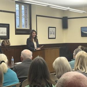 Select Board candidate Nicole Doyon Lynch addresses the crowd. 