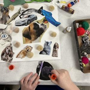 A student crafts a collage featuring animals and a car during a session at the Marion Art Center. Photo source: Marion Art Center