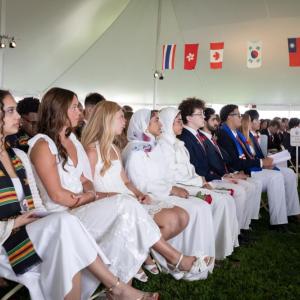 Tabor Academy seniors sit at graduation. 