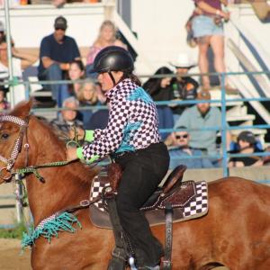 The racing stripes are on this rider instead of the flags.