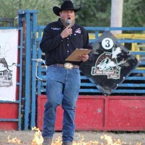 Eddie Pina announces the bull riders.