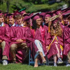 Graduates listen to the commencement speeches. 