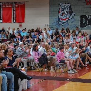 Community members packed the gym for the indoor ceremony. 