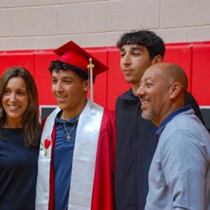 Families filled the gymnasium after the ceremony to celebrate the grads. 