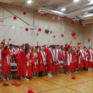 Graduating students toss their caps in the air at Old Rochester Regional High School's commencement on Saturday, May 30. Photos by Grace Roche