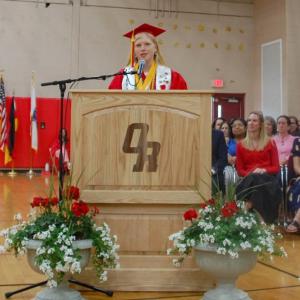 Valedictorian Ella Milhench gives a speech. 