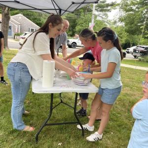 Kids work on an art project at the summer reading program. 