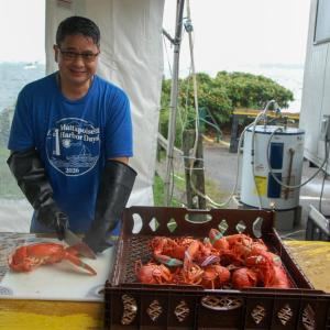 Dan Bell prepares food for the annual lobster dinner. 