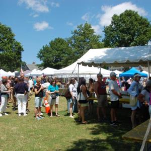 The Lions Club served food under the big white tent in the park. 