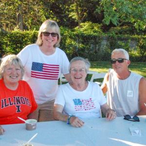 From left: Karen Gray, Tracy Djerf, Roxanne Burget and Drew Nahigyan, all of Mattapoisett, pose together at the community picnic. 