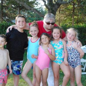 From left: Oz Lehner, 4, Colin Curtis, 9, Dakota Nahigyan, 8, Nola Nahigyan, 4, Mina Lehner, 7, and Vera Lehner, 7 smile with organizer Barbara Gaspar. 